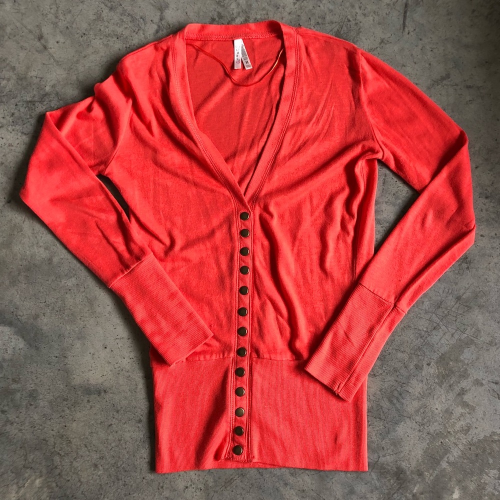 Coral snap sweater
